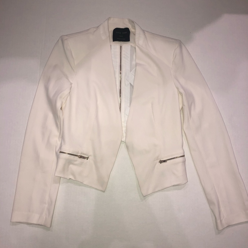 White/creme blazer with gold detailing zippers